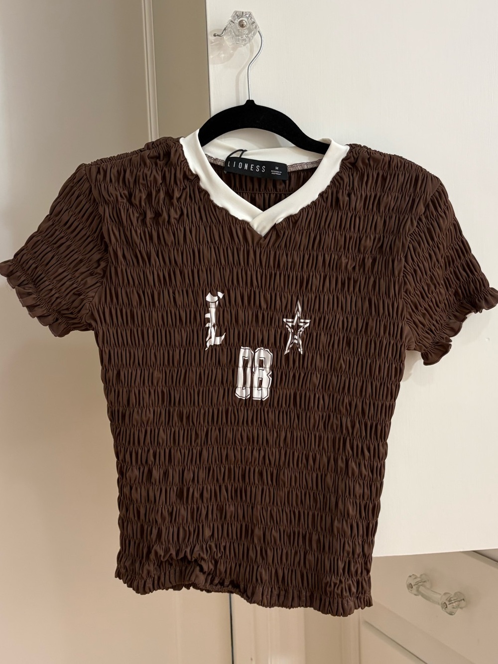 Lioness Brown Smocked Short Sleeve Tee with White V-Neck